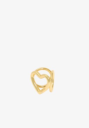 Anillo de oro en forma de corazón con dos secciones entrelazadas, que presenta un acabado pulido y brillante, con curvas suaves. Diseño minimalista para un uso moderno.