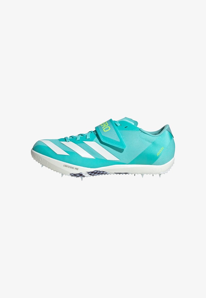 Turquoise racing spike shoes with white stripes, mesh upper, adjustable strap, and rubber outsole featuring metal spikes for traction.