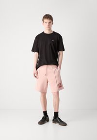 HUGO DEXEY RB - Donji dijelovi trenirke - light pastel pink