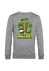 Felpa grigia con una grafica pixelata che riporta il testo "MINE. NAP. REPEAT." e personaggi di Minecraft in verde e marrone.
