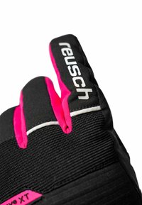 Black glove featuring pink accents and white stitching. The brand name "reusch" is prominently displayed on the index finger.