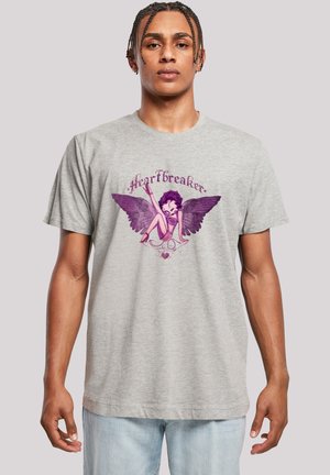 Graues Baumwoll-T-Shirt mit einem lila Grafikdesign eines Charakters mit Flügeln und dem Wort "#Heartbreaker" darüber. Kurze Ärmel, runder Halsausschnitt.