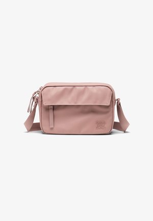 Pink synthetic crossbody bag with a front flap, zip closure, and adjustable strap. Features embossed logo and a smooth texture.