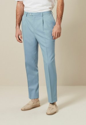 Next RELAXED FIT MOTIONFLEX - Puvunhousut - light blue
