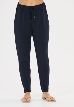 Athlecia, SWEATPANTS JACEY - Tracksuit bottoms - dark sapphire