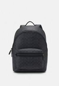 Black textured backpack with a rounded top, featuring a front zippered pocket, adjustable straps, and a subtle pattern throughout.