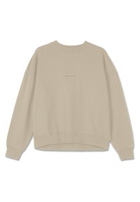 Smėlinis megztinis, pagamintas iš minkštos medvilnės, su apvalia iškirpte, nuleistomis petnešomis ir banguotais rankogaliais, ant priekio išsiuvinėtas žodis "PEGAADOR".