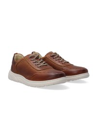 Braune Lederschuhe mit perforierten Details, runder Zehenpartie und Schnürdesign. Verfügt über eine weiße gepolsterte Sohle für zusätzlichen Komfort.