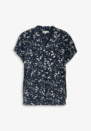 Blouse bleu marine à manches courtes avec motif de points blancs irréguliers, encolure en V et coupe décontractée.