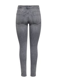 Grijze denim skinny jeans met een hoge tailleband, twee achterzakken en een gladde textuur. De stof lijkt licht vervaagd.