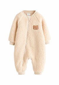 Fleece baby onesie in soft beige, featuring a bear embroidery on the front, full zipper, and ribbed cuffs for a snug fit.