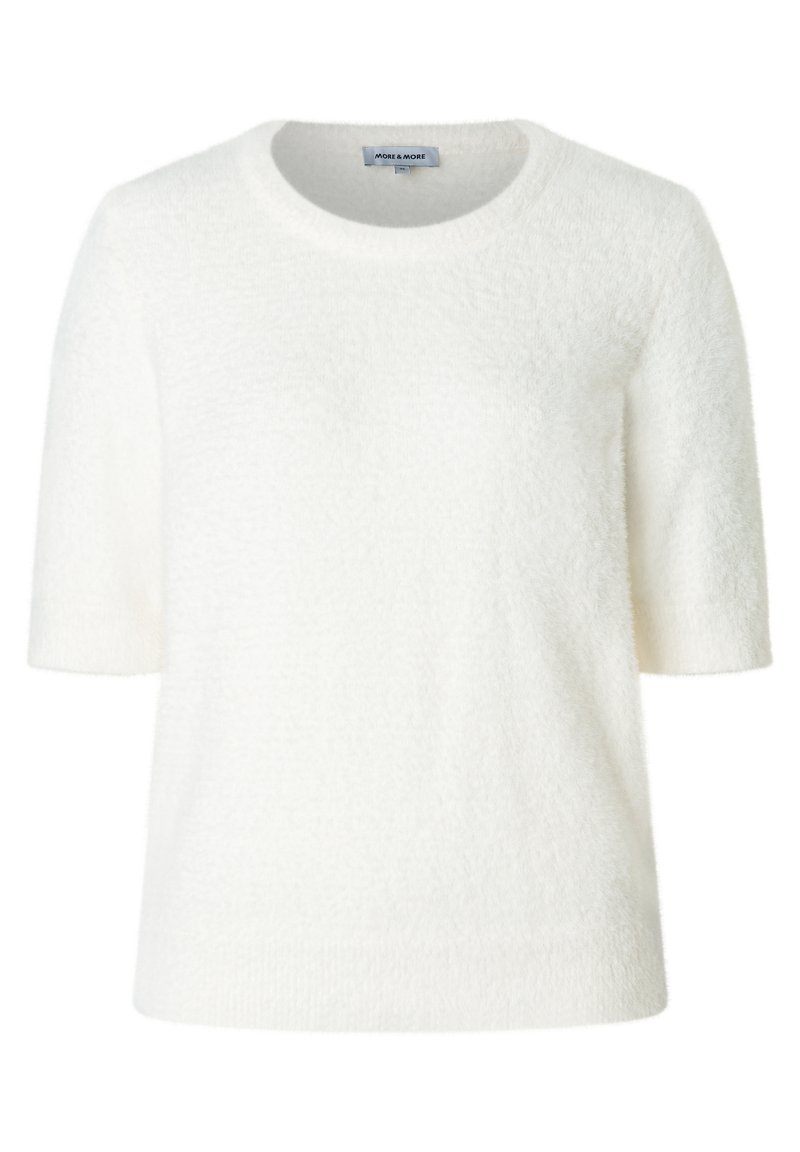 Pull blanc à manches courtes en tissu doux et texturé, avec un col rond. Le design est simple, sans motifs ni accents supplémentaires.