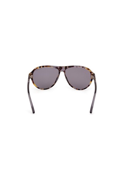 Sunglass med skildpaddeformation, grå linser og lette klare arme. Har subtile accenter på linserne og en glat overflade.