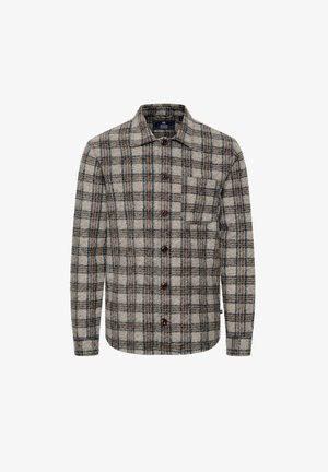 Cămașă din flanel bej cu model în carouri maro și albastru. Prezintă un nasture frontal, guler și un buzunar la piept cu nasturi maro.