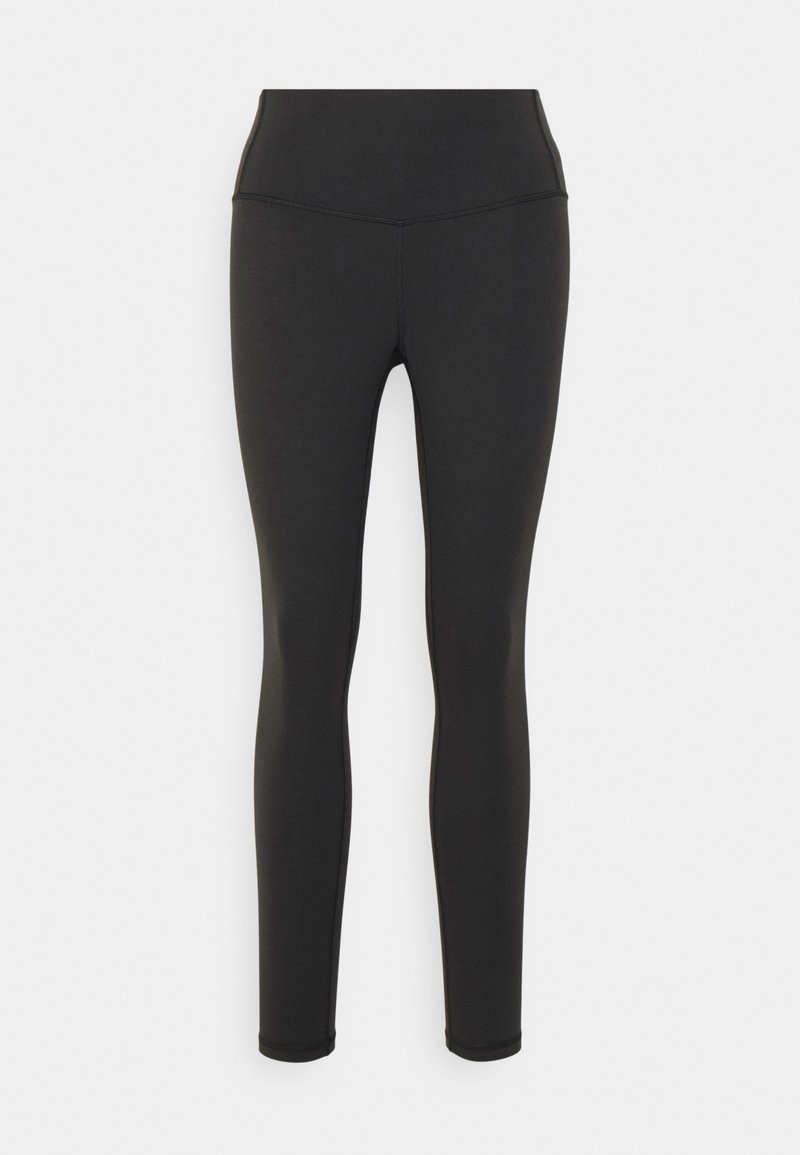 Svarta leggings tillverkade av stretchigt tyg, med hög midja, slät yta och utan synliga mönster eller detaljer i metall.