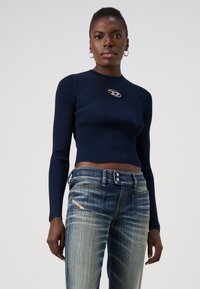 Diesel D-HUSH - Platėjantys džinsai - 01