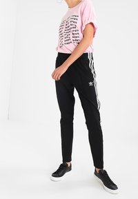 adidas Originals Träningsbyxor - black