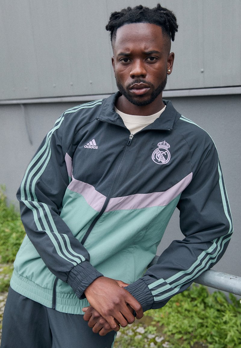 adidas Performance REAL MADRID SZN TRACK TOP - Squadra - carbon/silver green