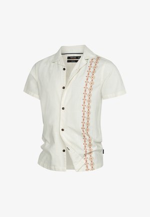 Short-sleeve shirt in off-white linen. Features a button front and intricate red embroidery along the left side, adding texture and detail.