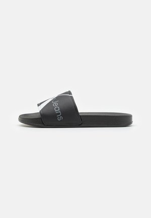 Calvin Klein Jeans FREDDIE UNISEX - Sandalias planas - black