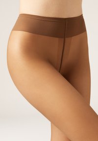 Brown sheer tights with a smooth, semi-transparent texture and a wide waistband. Emphasizes leg shape with a natural skin tone appearance.