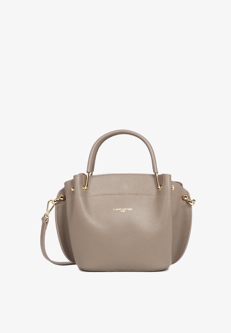 Sac à main en cuir gris galet avec deux poignées supérieures, bandoulière amovible et quincaillerie dorée. Présente un logo subtil sur le devant.