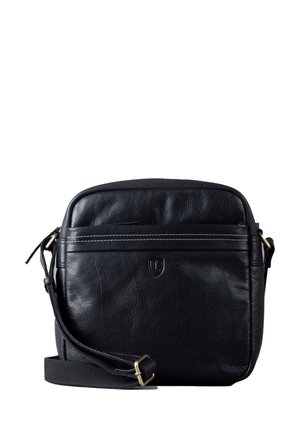 Black leather crossbody bag with a smooth texture, zip closure, and an adjustable strap. Features a front pocket and subtle stitching details.