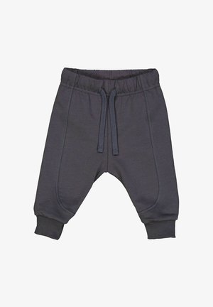 Harmaat collegehousut, jotka on valmistettu pehmeästä kankaasta, jossa on joustava vyötärö, nyöriyksityiskohta ja ribbetut hihansuut. Sisältää sivusauman yksityiskohtia.