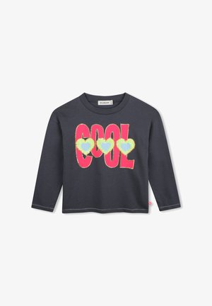 Donkergrijs shirt met lange mouwen met grote roze "COOL" tekst en drie gele harten met blauwe centra over de borst.