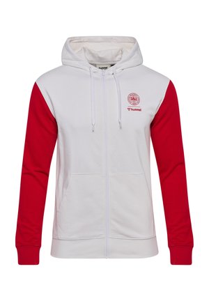 Biała bluza z kapturem na zamek, z czerwonymi rękawami, przednimi kieszeniami, sznurkiem w kapturze oraz czerwonymi logo DBU i hummel na lewej piersi.