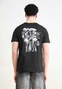 Alpha Industries - ALOHA - Print T-shirt - black Thumbnail Image 1