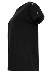 Black short-sleeve top featuring a relaxed fit, smooth texture, and decorative silver buttons on the shoulder. Simple and versatile design.