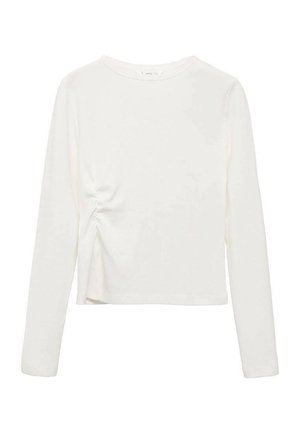 Chemise blanche à manches longues avec un col rond et un détail froncé sur le côté gauche. Fabriquée dans un tissu lisse et doux, avec une coupe ajustée.