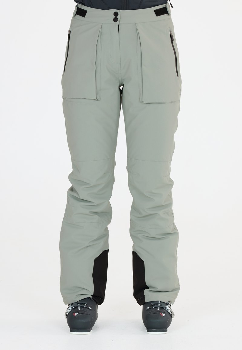 Hiihtohousut vaaleanharmaana rentona istuvuutena, joissa on kaksi etutaskua, musta alaosa ja vettä hylkivä materiaali.