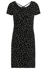 Robe noire à manches courtes avec un motif en carré blanc. Décolleté en V avec des bretelles croisées dans le dos ; silhouette ajustée.
