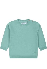 Grön tröja med långa ärmar, rund halsringning och två dekorativa knappar på axeln. Ribbad manschett och nederkant. Slät struktur.