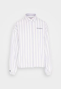 Camicia a maniche lunghe a righe in bianco, lavanda e navy. Presenta un colletto con bottoni, polsini elasticizzati e una tasca sul petto con dettagli del logo.