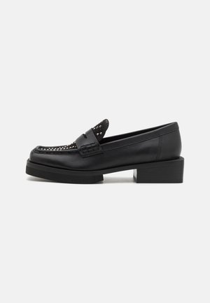 Black leather loafers with a square toe and block heel. Features decorative stitching and studded accents on the vamp.