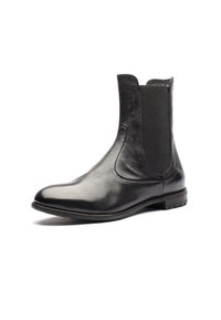 Stivale Chelsea in pelle nera con pannelli laterali elastici, punta a mandorla e finitura liscia. Dotato di una suola in gomma bassa per una migliore aderenza.