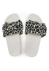 Leopard print slide sandals with a wrap-around bow design, featuring a white textured sole and a smooth, light-colored footbed.