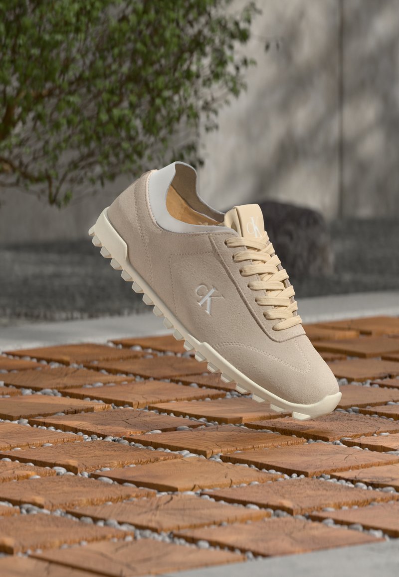 Calvin Klein LOW PROFILE RUN LACES - Trainers - light cashew/off-white ...