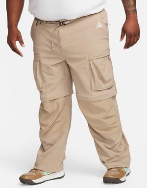 Beige cargo pants with adjustable waistband, multiple cargo pockets, and a relaxed fit. Features a smooth texture and reinforced stitching.