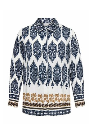 Balta garām piedurknēm krekls ar tumši ziliem grezniem rakstiem un brūnu ziedu apmali pie apakšmala un aprocēm.