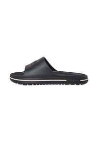 Sandal in gomma nera con una larga apertura frontale, parte superiore testurizzata e una striscia bianca lungo la suola. Realizzato in gomma con una presa durevole.