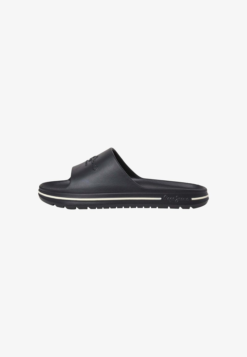 Black slide sandal featuring a wide front opening, textured upper, and a white stripe along the sole. Made of rubber with a durable grip.