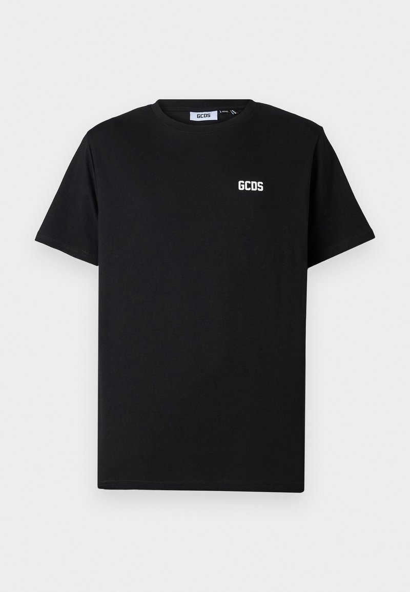 Camiseta preta de algodão com mangas curtas, gola redonda e um pequeno logótipo GCDS branco no lado esquerdo do peito. Textura suave, cor sólida.