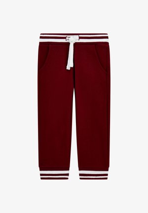 Bordeaux sweatpants met witte trekkoord, twee zijzakken en geribbelde witte en bordeaux boorden. Zachte stof met een relaxte pasvorm.