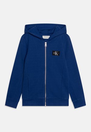 Calvin Klein Jeans BADGE ZIP THROUGH UNISEX - Felpa con zip - pigment blue