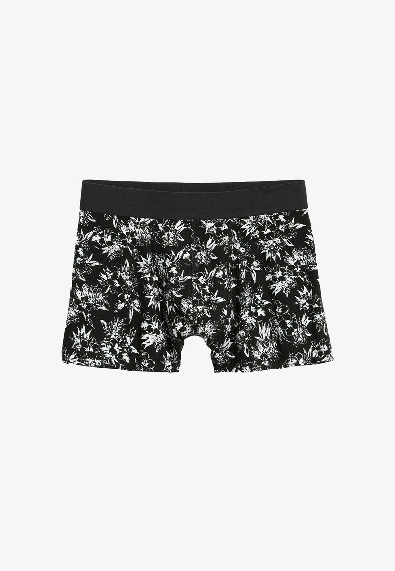 Black boxer briefs with a floral pattern in white. Made from stretchable fabric, featuring a black elastic waistband for comfort.