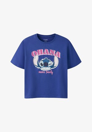 Blue short-sleeve children's T-shirt with a winking cartoon character, large "OHANA" text above, and "means family" text below.